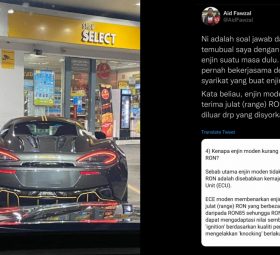 Wanita isi minyak RON 95 pada kereta McLaren